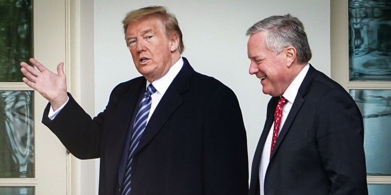 President Donald Trump walks with Chief of Staff Mark Meadows after returning to the White House from an event at the WWII memorial on May 8, 2020.