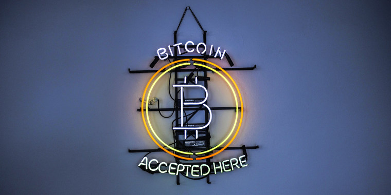 A neon sign indicates that Bitcoin is accepted inside a venue in Prague, Czech Republic, on May 17, 2022.