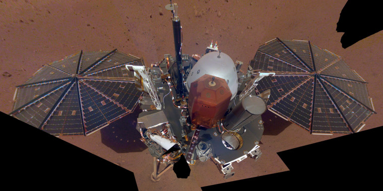 This composite image made available by NASA on Dec. 11, 2018 shows the InSight lander on the surface of Mars.