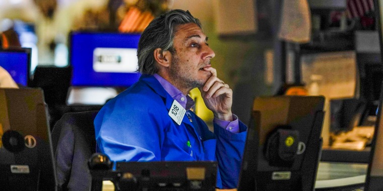 A trader works on the floor at the New York Stock Exchange in New York on May 19, 2022.