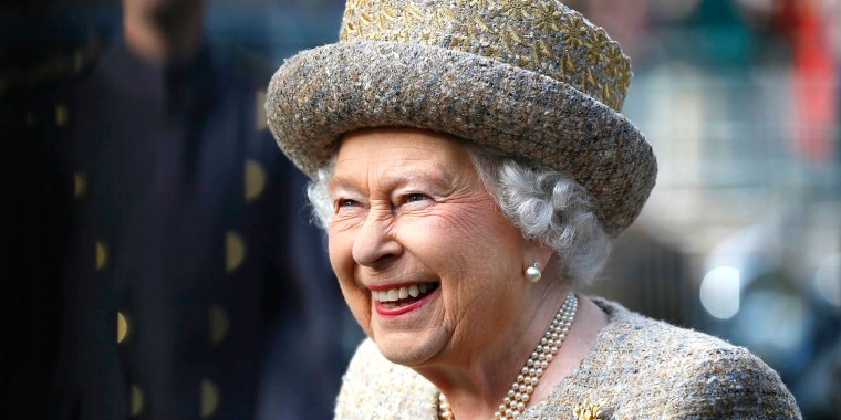 Queen Elizabeth II smiles as she arrives before the Opening of the Flanders' Fields Memorial Garden at Wellington Barracks on November 6, 2014 in London, England.