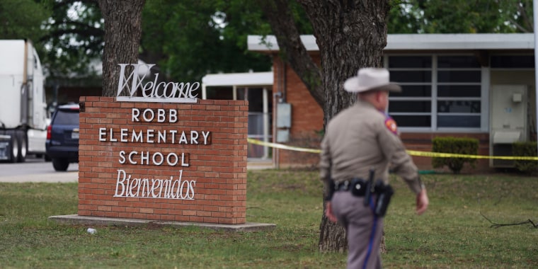 An officer walks outside of Robb Elementary School in Uvalde, Texas, on May 24, 2022.