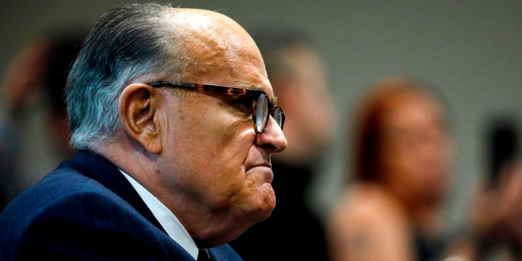 Rudy Giuliani appears before the Michigan House Oversight Committee in Lansing on Dec. 2, 2020.