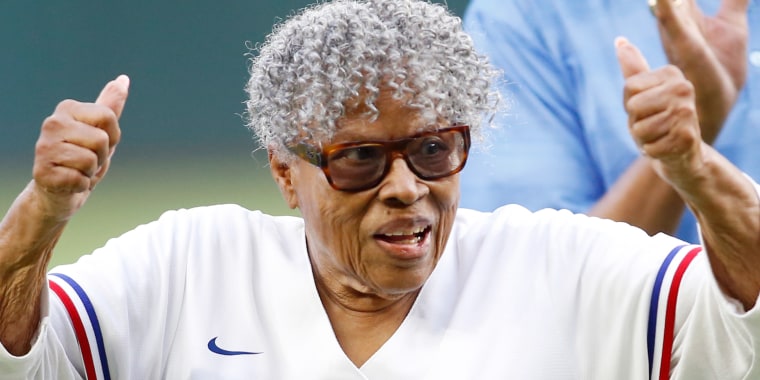 ARLINGTON, TEXAS - APRIL 15: Opal Lee reacts after throwing out the first pitch before the game between the Texas Rangers and the Los Angeles Angels at Globe Life Field on April 15, 2022 in Arlington, Texas. All players are wearing the number 42 in honor of Jackie Robinson Day.   (Photo by Tim Heitman/Getty Images)
