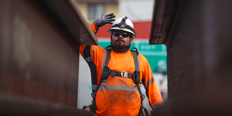 Removal of falsework under Sixth Street bridge in Los Angeles.