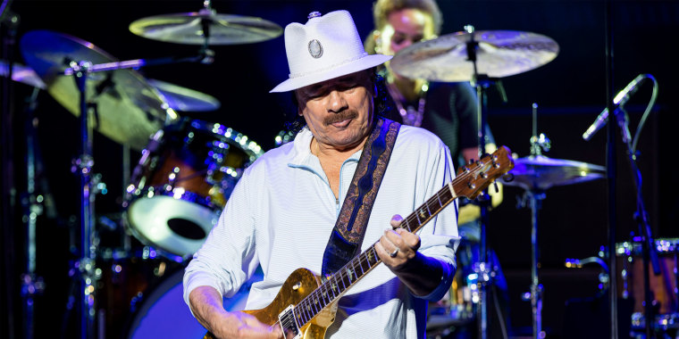 Carlos Santana performing at Pine Knob Music Theatre in Clarkston, Michigan, before collapsing onstage.