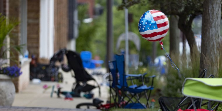 Chairs, bicycles, strollers and balloons were left behind at the scene of a mass shooting on the Fourth of July parade route along Central Avenue in Highland Park.
