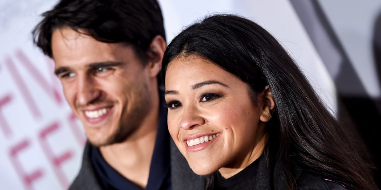 Image: Gina Rodriguez and Joe Locicero attend the premiere of 'Five Feet Apart' on March 7, 2019 in Los Angeles, Calif.