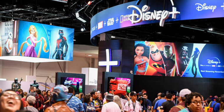 Image: Attendees visit the Disney+ streaming service booth at the D23 Expo on August 23, 2019 in Anaheim, Calif.