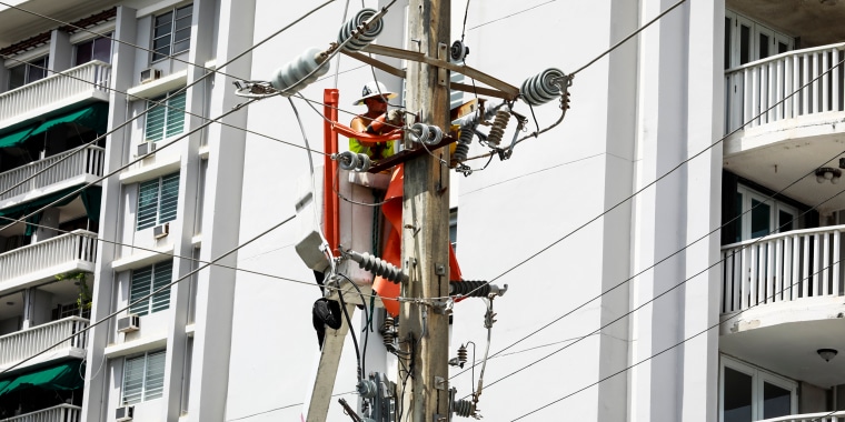 LUMA workers try to restore energy in San Juan, Puerto Rico, on Sept. 20, 2022.