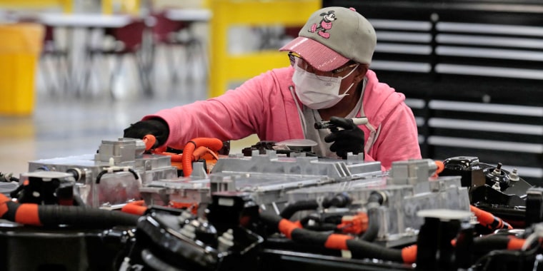 A worker on the production line at Ford's Rouge Electric Vehicle Center in Dearborn, Mich., on Sept. 8, 2022.