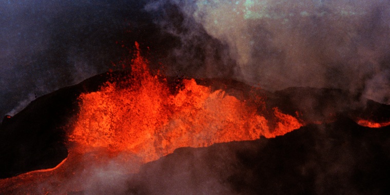 Molten rock flows from Mauna Loa on March 28, 1984, near Hilo, Hawaii. 