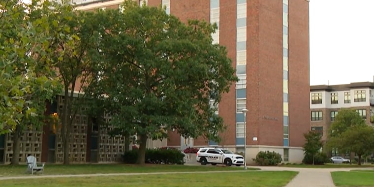 A police vehicle is parked outside McCutheon Hall on the Purdue University campus, in West Lafayette, Ind., on Oct. 5.