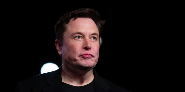 Tesla CEO Elon Musk pauses while speaking before unveiling the Model Y at the company's design studio in Hawthorne, Calif., on March 14, 2019.