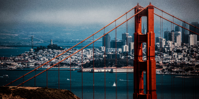 San francisco city skyline with Golden Gate Bridge on foreground