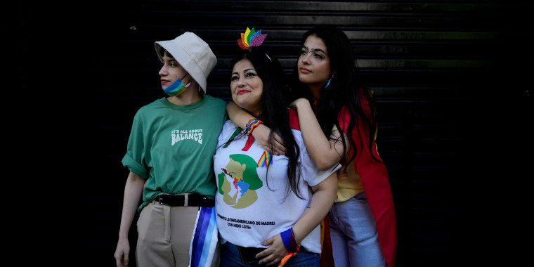 Claudia Delfín of Bolivia with her trans son Zan, and her bisexual daughter Celeste, in Buenos Aires.