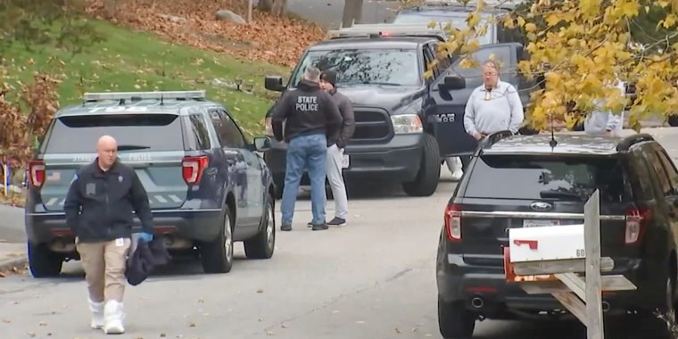 Police respond to the scene of two killings in Marshfield, Mass., on Nov. 30, 2022.