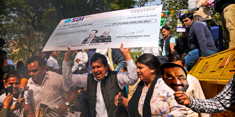 Members of opposition Congress party, demanding an investigation into allegations of fraud and stock manipulation by India's Adani Group shout slogans during a protest in New Delhi, India, Monday, Feb.6, 2023. The Congress party urged people to protest, adding to pressure on Prime Minister Narendra Modi to respond to a massive sell-off of shares in Adani Group companies after a U.S.-based short-selling firm, Hindenburg Research, accused them of various fraudulent practices. The Adani group has denied any wrongdoing.