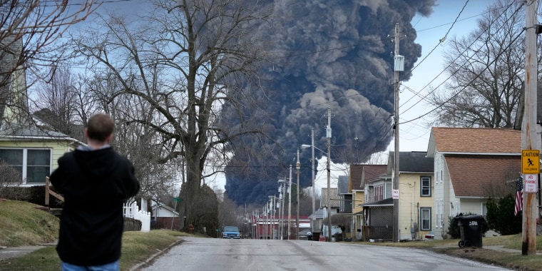 A black plume rises over East Palestine, Ohio, after a controlled detonation of a portion of the derailed Norfolk and Southern trains on Feb. 6, 2023. 