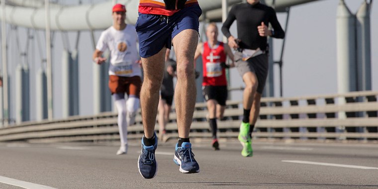 Runners make their way across the Verrazano-Narrows Bridge during the start of the New York City Marathon on Nov. 3, 2019.