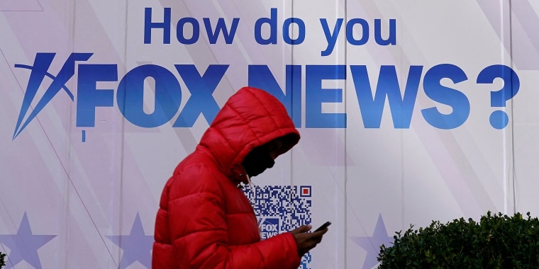 A person walks past the Fox News headquarters in New York on March 9, 2023.
