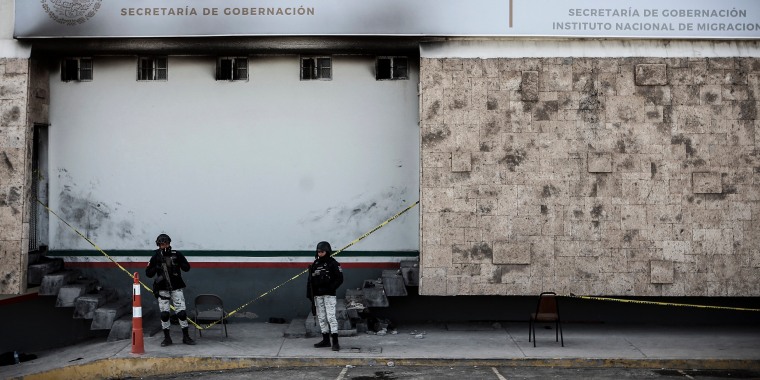 Image: Police stand guard outside a Mexican immigration detention center in Ciudad Juarez, Mexico, on March 28, 2023.