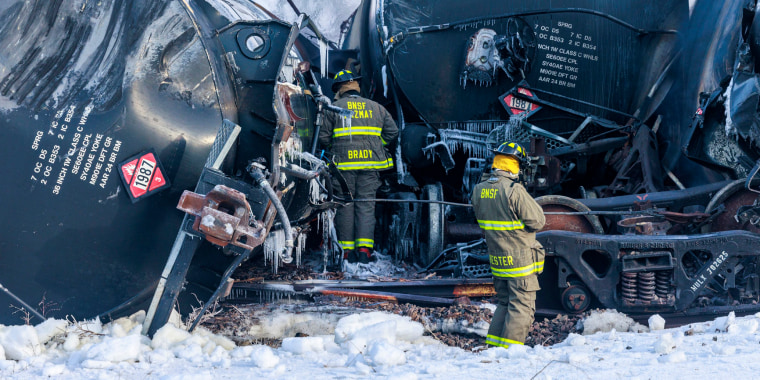 Emergency personnel work at crash site near Raymond, Minn. 