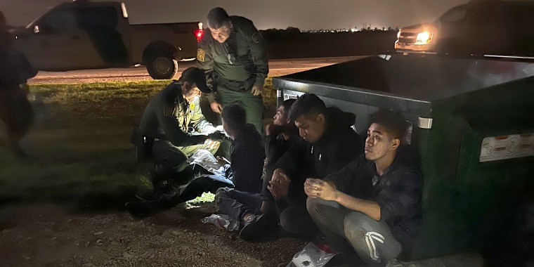 Border Patrol apprehends migrant men early Thursday in Granjeno, Texas.

