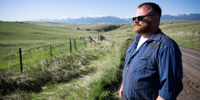 Garrett Mahon, a supporter of the Greater Idaho Movement, looks out over land in the direction of the Idaho border, near his 600-plus acre timber property in Wallowa, Oregon, on May 13, 2023. 
