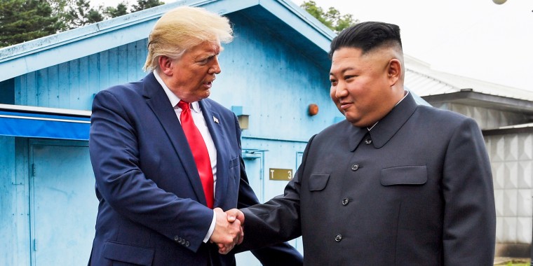 President Donald Trump shakes hands with North Korean leader Kim Jong Un at the border village of Panmunjom in the Demilitarized Zone, South Korea, on June 30, 2019.