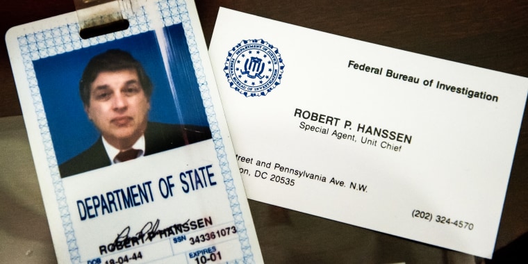 Image: The identification and business card of former FBI agent Robert Hanssen inside a display case at the FBI Academy in Quantico, Va., on May 12, 2009.