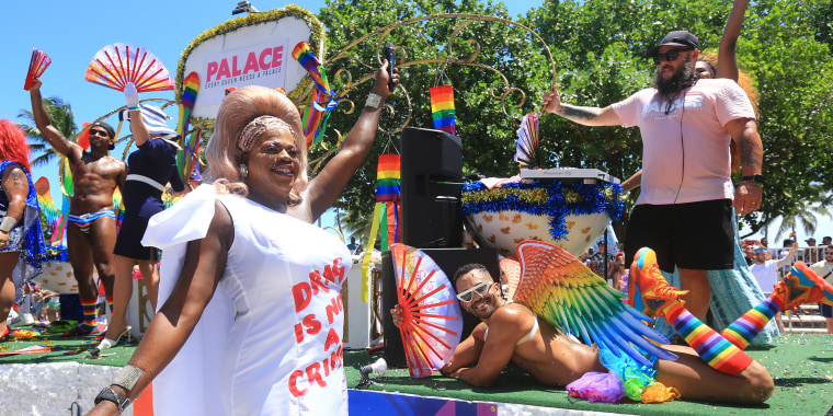 MIAMI BEACH, FL - APR 16: Celebrated drag personality and Palace ambassador Tiffany Fantasia co-hosts the 15th annual Miami Beach Pride Parade wearing a custom dress that declares, "Drag is not a crime" on Sunday, April 16, 2023 in Miami Beach, Florida.