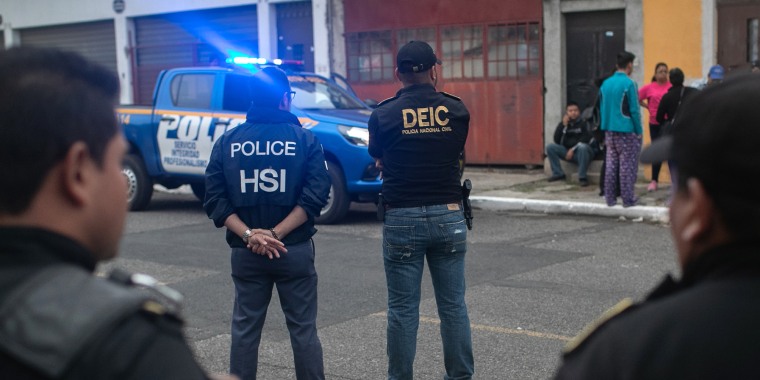 Agents from ICE, Homeland Security Investigations, and Guatemalan police stand at the scene 
