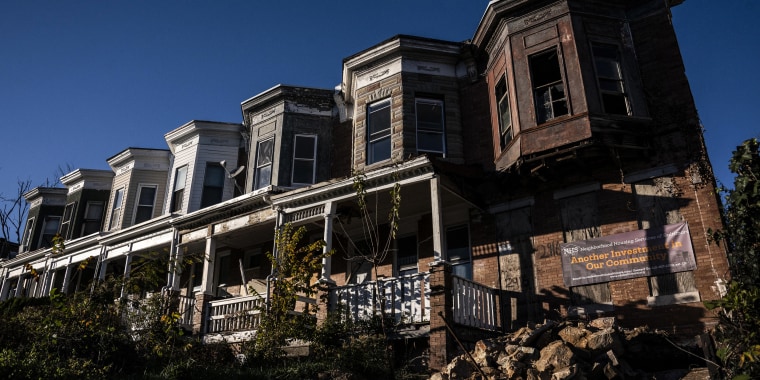 Inhabited and abandoned homes are seen along Walbrook Avenue in West Baltimore, Md., on Nov. 9, 2022.