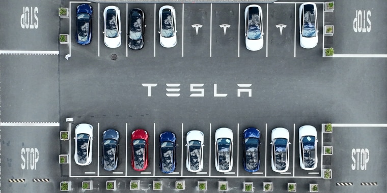 Cars in a lot at the Tesla factory in Fremont, Calif., in 2022. 