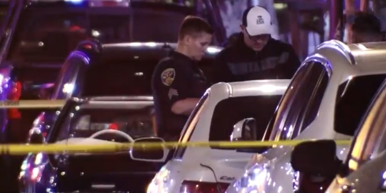 Police at the scene of a mass shooting in San Francisco Friday night.