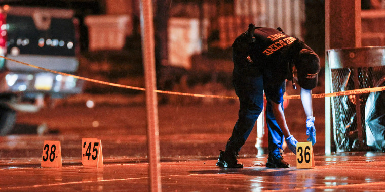 Police work at the scene of a mass shooting in Philadelphia