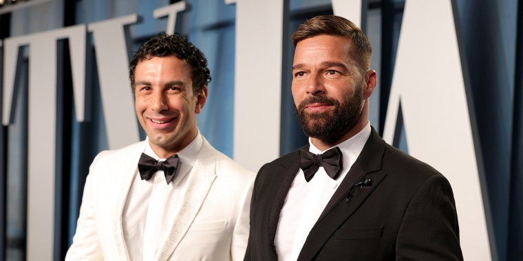 From left, Jwan Yosef and Ricky Martin attend the 2022 Vanity Fair Oscar Party in Beverly Hills, Calif.