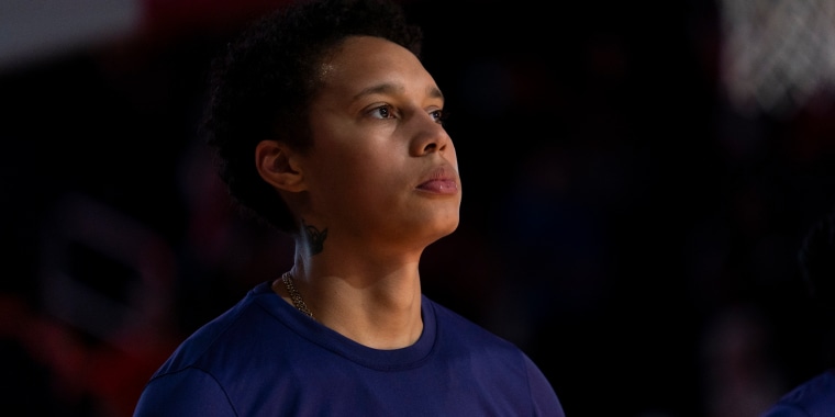 Phoenix Mercury center Brittney Griner stands at attention during the national anthem before a WNBA basketball game against the Washington Mystics, Sunday, July 23, 2023, in Washington.