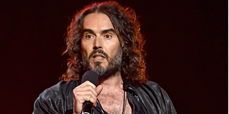 Russell Brand performs in 2020. 
