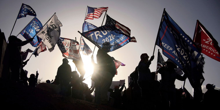 FILE - In this Nov. 8, 2020, file photo supporters of President Donald Trump protest the election outside of the Clark County Election Department in North Las Vegas. Republican leaders in four critical states won by President-elect Joe Biden say they won’t participate in a legally dubious scheme to flip their state’s electors to vote for President Donald Trump. Their comments effectively shut down a half-baked plot some Republicans floated as a last chance to keep Trump in the White House. (AP Photo/John Locher, File)