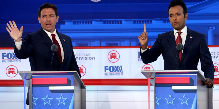 Image: Republican presidential candidates Ron DeSantis and Vivek Ramaswamy speak during a presidential primary debate in Simi Valley, Calif., on Weds. night.
