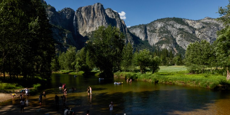 Tourists on the Merced River in Yosemite National Park, Calif.  on June 29, 2022. 