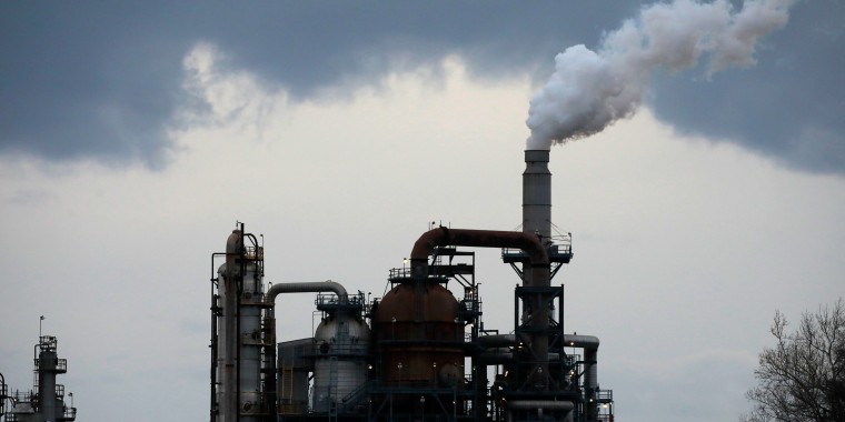 Emissions rise an oil refinery in the U.S. 