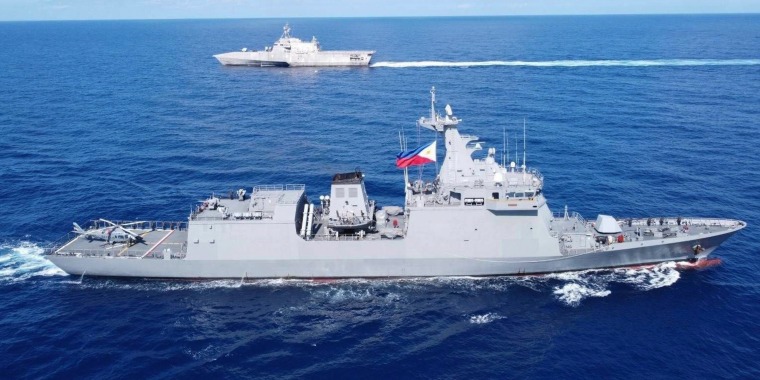 FILE - In this handout photo released by Armed Forces of the Philippines, Philippines BRP Jose Rizal (FF150), right, and USS Gabriel Giffords (LCS 10) during a tactical exercise between Philippines and the United States in the West Philippine Sea.