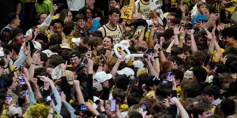 Wake Forest's Matthew Marsh celebrates with fans after Wake Forest's win over Duke in an NCAA college basketball game in Winston-Salem, N.C., on Saturday, Feb. 24, 2024. 
