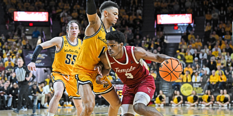 Hysier Miller #3 of the Temple Owls dribbles the ball against Xavier Bell #1 of the Wichita State Shockers in Wichita, Kansas on Feb. 25, 2024. 