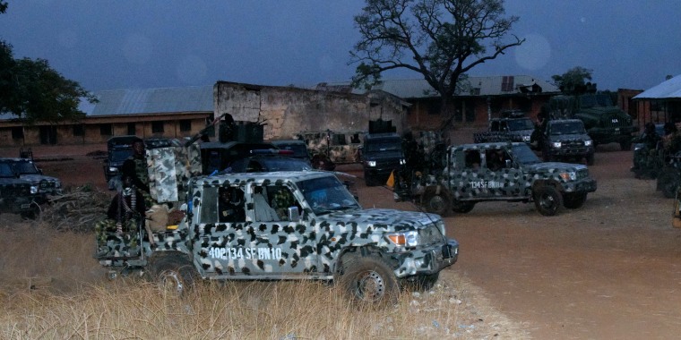 Nigerian Army trucks are parked at the school were children were kidnapped in Chikun, Nigeria, Thursday, March 7, 2024. Gunmen attacked a school in Nigeria's northwest region Thursday morning and abducted at least 287 students, the headteacher told authorities, marking the second mass abduction in the West African nation in less than a week.