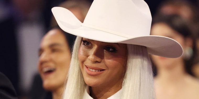 Beyoncé wearing a cowboy hat at the Grammy Awards.