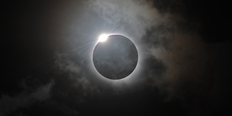 The Diamond Ring effect is shown following totality of the solar eclipse at Palm Cove in Australia's Tropical North Queensland in 2012.
